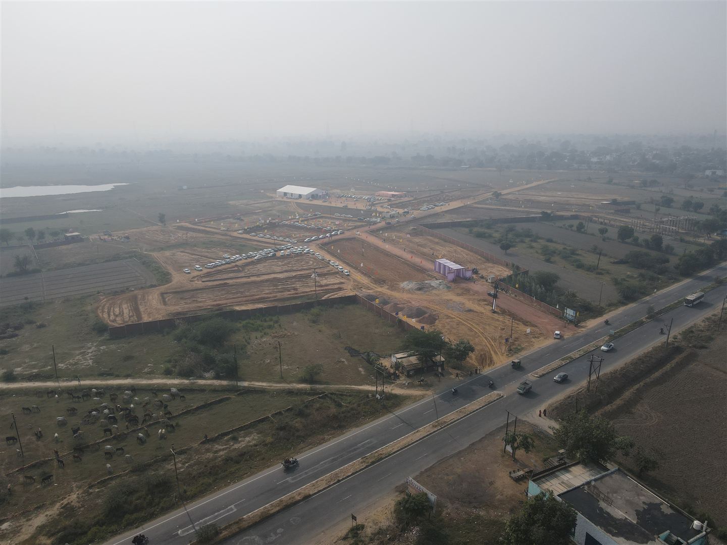 Main highway frontage running alongside GoldenCity Township